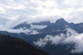 Clouds hanging over rugged mountains in Southern Alaska Royalty Free Stock Photo