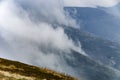 Clouds on the hills high in the mountains Royalty Free Stock Photo