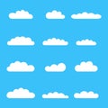 Clouds icon set. Different cloud shapes isolated on the blue sky background Royalty Free Stock Photo