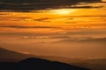 Clouds and inversion mist during sunrise from Mala Chochula mountain