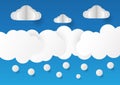 Clouds isolated on blue background in paper cut style. Royalty Free Stock Photo