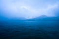 Clouds mist over Caburga lake, southern Chile