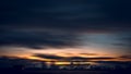 Clouds in motion at sunset over the city. Sunset over the city. Royalty Free Stock Photo
