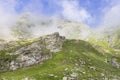 Clouds in the mountains on a sunny day