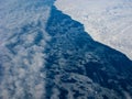 Clouds, ocean and Greenland coastline Royalty Free Stock Photo