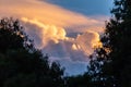 Clouds in orange, light blue and pink