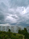 Clouds over city. Overcast. Smog above apartment building. Problem of air quality. Pollution. Environmental conservation. Climate Royalty Free Stock Photo