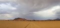 Clouds over dry desert landscape