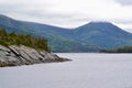 Clouds over hilly coastal landscape along Bonne Bay at Norris Point Royalty Free Stock Photo