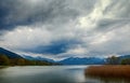 Clouds over the lake Tegernsee and the Bavarian Alps, beautiful landscape with mountains, water and sky in the famous tourist Royalty Free Stock Photo