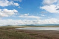 Clouds over the lake. Tyva. Steppe. Sunny summer day Royalty Free Stock Photo
