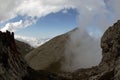 Clouds over mountain peaks. Fog in the Caucasus mountains. Royalty Free Stock Photo