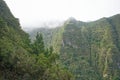 clouds over mountain ravines with Laurisilva forest in Madeira Royalty Free Stock Photo