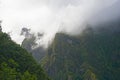 clouds over mountain ravines with Laurisilva forest in Madeira Royalty Free Stock Photo