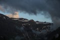 Clouds over a mountain ridge in Gsteig Bei Gstaad