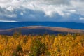 Clouds over the mountainous part of the tundra in autumn