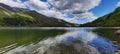 Clouds over the moutain lake Royalty Free Stock Photo