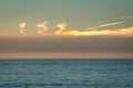 Sundog in clouds above the sea Royalty Free Stock Photo