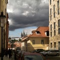 Clouds over Prague. View of St. Vitus Cathedral Prague Castle, Czech Republic, Prague from the side of a small alley