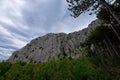 Clouds over the rocks Royalty Free Stock Photo