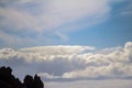 Clouds over rocks Royalty Free Stock Photo