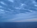 Clouds over the sea, layered clouds, sunset, breeze Royalty Free Stock Photo