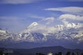 Clouds over the snow capped mountain range, Himalayas, Uttarakhand, India Royalty Free Stock Photo