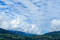 Clouds over the town of Combloux in the Mont Blanc Massif in Europe, France, the Alps, towards Chamonix, in summer, on a cloudy Royalty Free Stock Photo