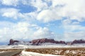 Clouds over US Route 163 looking south to Monument Valley after a snowfall, Utah Royalty Free Stock Photo