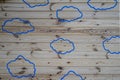 clouds painted withe blue paint on a wall made of wood boards Royalty Free Stock Photo