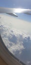 Clouds pattern from aeroplane window in white colour with peace