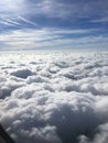 Clouds from a plane window Royalty Free Stock Photo