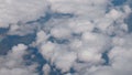 Clouds puffy fluffy sky aerial plane drone view on land earth ground