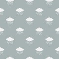 Clouds and rain drops vector seamless pattern. White cloud on blue background. Royalty Free Stock Photo