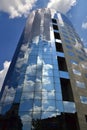 Clouds reflected on a glass skyscraper Royalty Free Stock Photo