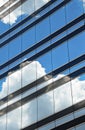 Clouds reflected in windows