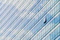 Clouds reflected in windows of modern office building Royalty Free Stock Photo