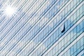 Clouds reflected in windows of modern office building Royalty Free Stock Photo