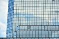 Clouds reflected in windows of modern office building Royalty Free Stock Photo