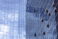 Clouds Reflected in Windows of Modern Office Building Royalty Free Stock Photo