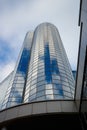 Clouds reflection on highrise glass building against sky Royalty Free Stock Photo