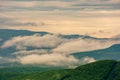 Clouds rising above the hills