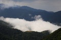 Clouds rolling between hills of himachal. Royalty Free Stock Photo