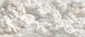 Clouds in shades of grey and white set against a light grey background, offering ample room for text or design additions Royalty Free Stock Photo