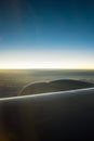 Clouds and sky as seen through window of an aircraft Royalty Free Stock Photo