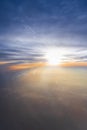 clouds sky skyscape in sunset time. view from the window of an airplane flying in the clouds, top view clouds like  the sea of Royalty Free Stock Photo