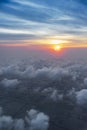 clouds sky skyscape in sunset time. view from the window of an airplane flying in the clouds, top view clouds like  the sea of Royalty Free Stock Photo