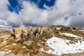 Clouds, snow, and rocks of Australian Alps. Royalty Free Stock Photo