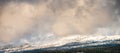 Clouds and snow on the top of mount ventoux ,provence france.Winter landscape panarama