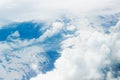 Clouds and snowy mountain ridges. Top view Royalty Free Stock Photo